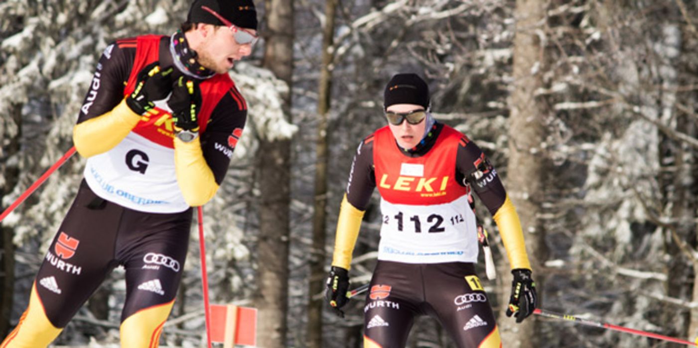 Die Biathletin Vivian Hösch und ihr Begleitläufer Norman Schlee beim Nordischen Skiweltcup in Oberried